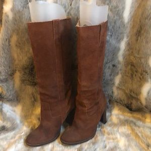 Brown/cognac size 6.5 leather Steve Madden boots.